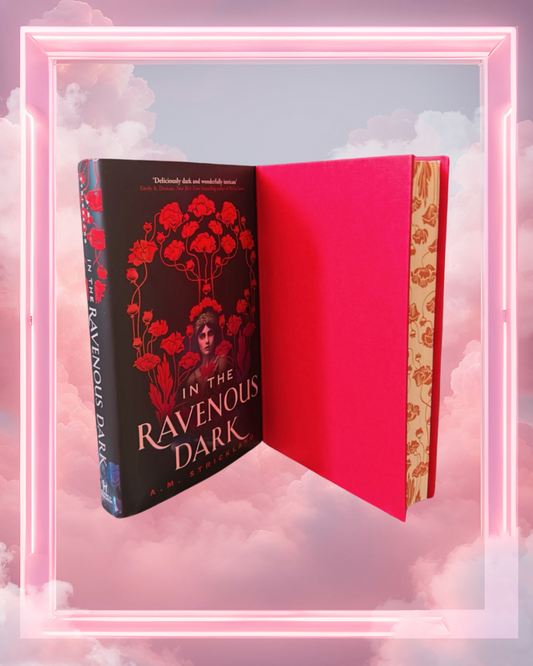 In the Ravenous Dark by A.M. Strickland